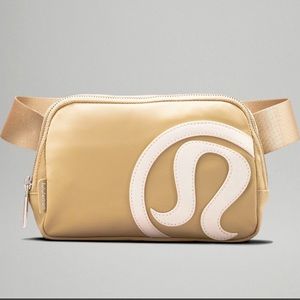Tan logo lululemon belt bag NWT